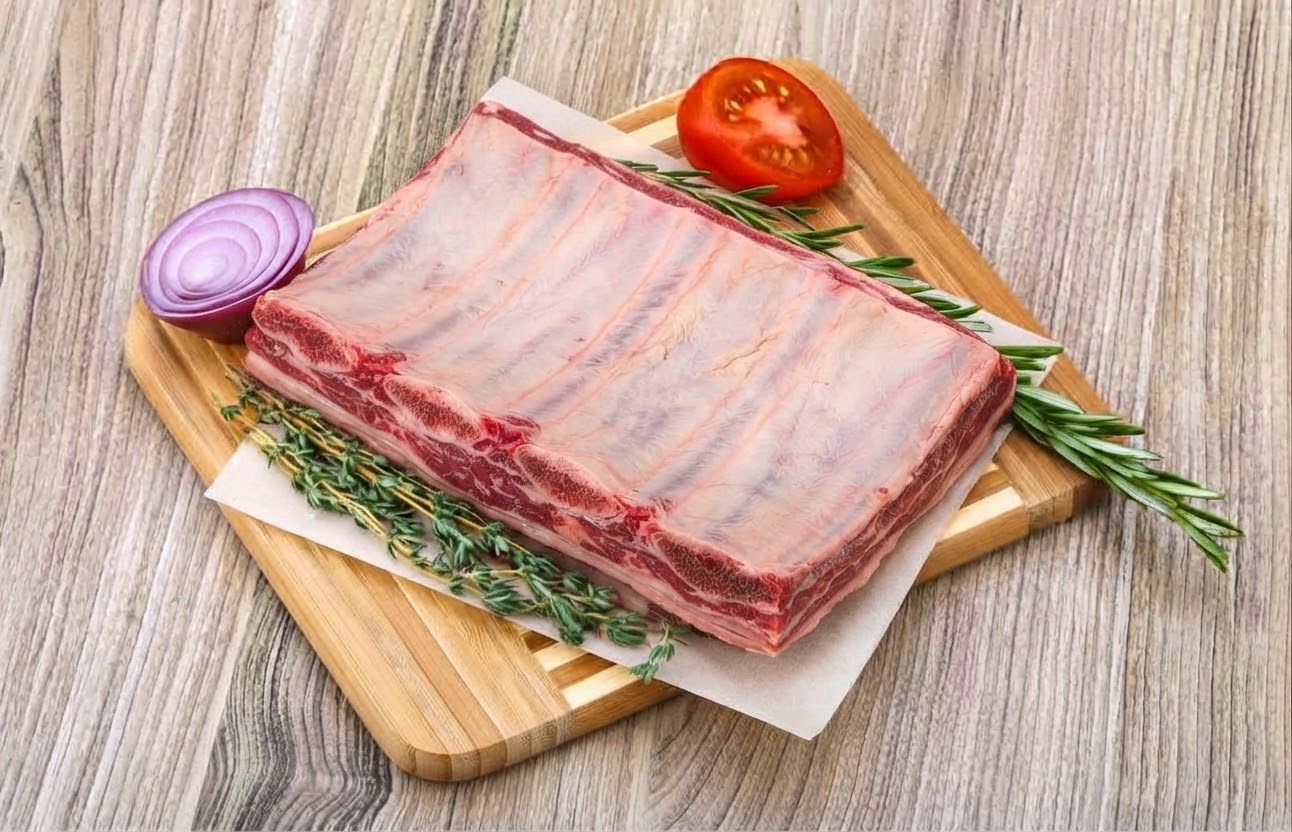 Grass-fed organic beef dino ribs, raw, bone-in