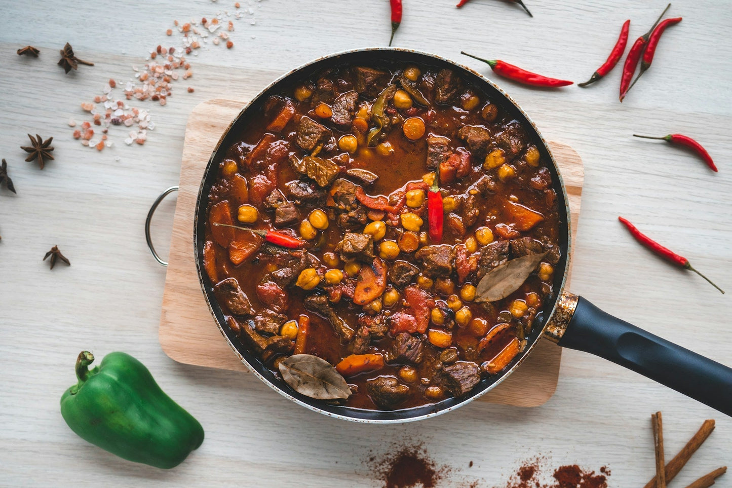 Bowl of classic beef chili with toppings