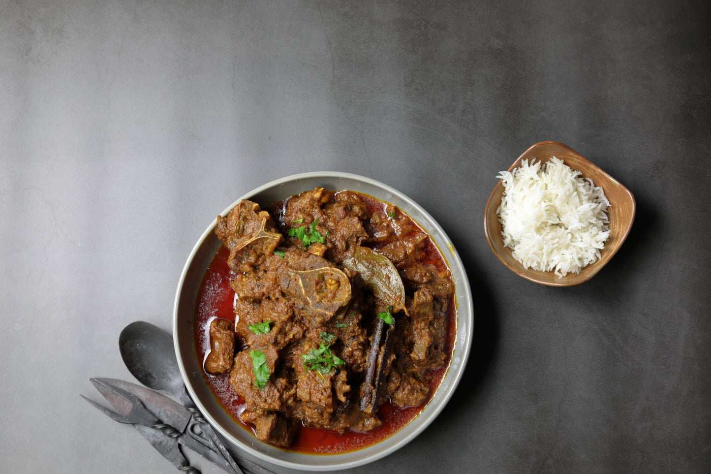 Slow-cooked goat stew with root vegetables