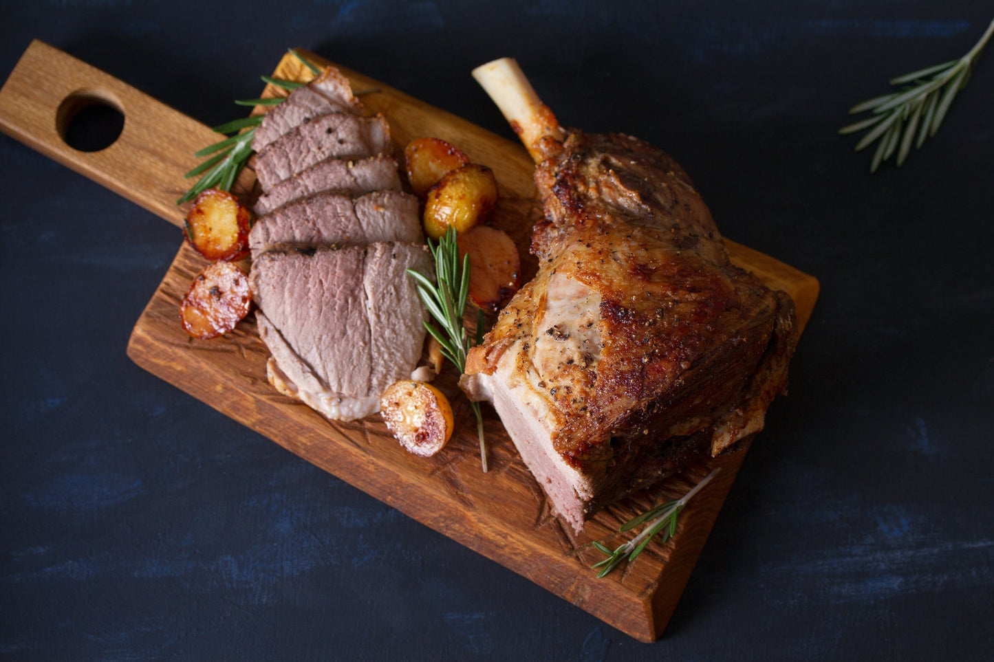 Spice-rubbed bone-in goat leg slow roasted until tender