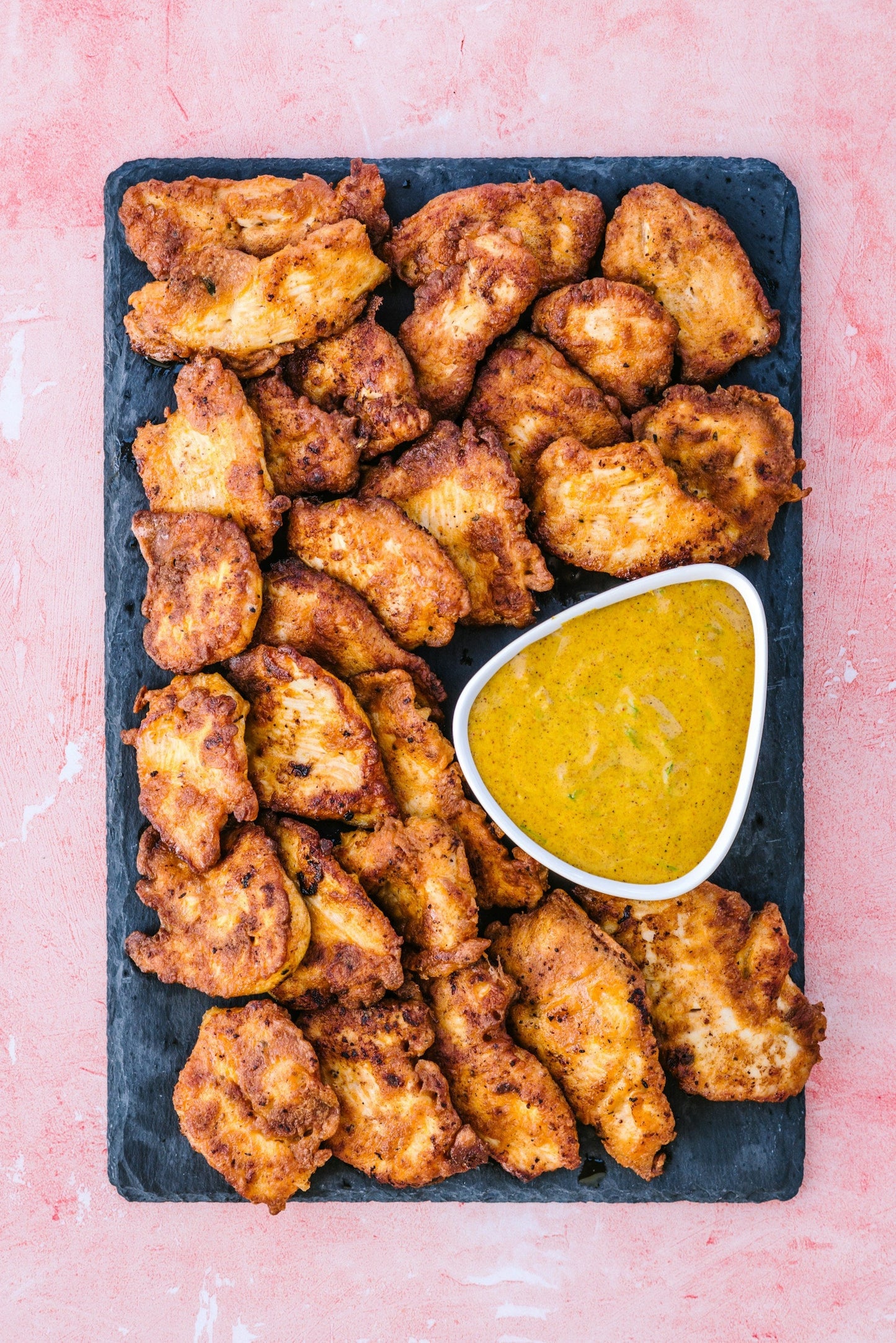 Crispy baked chicken thighs on a wire rack
