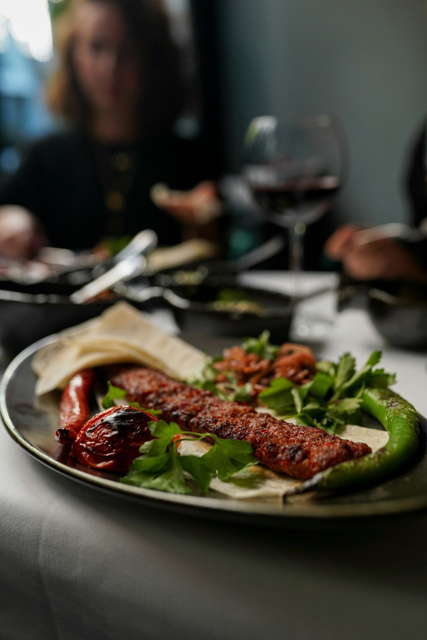Grilled lamb kofta skewers with fresh herbs