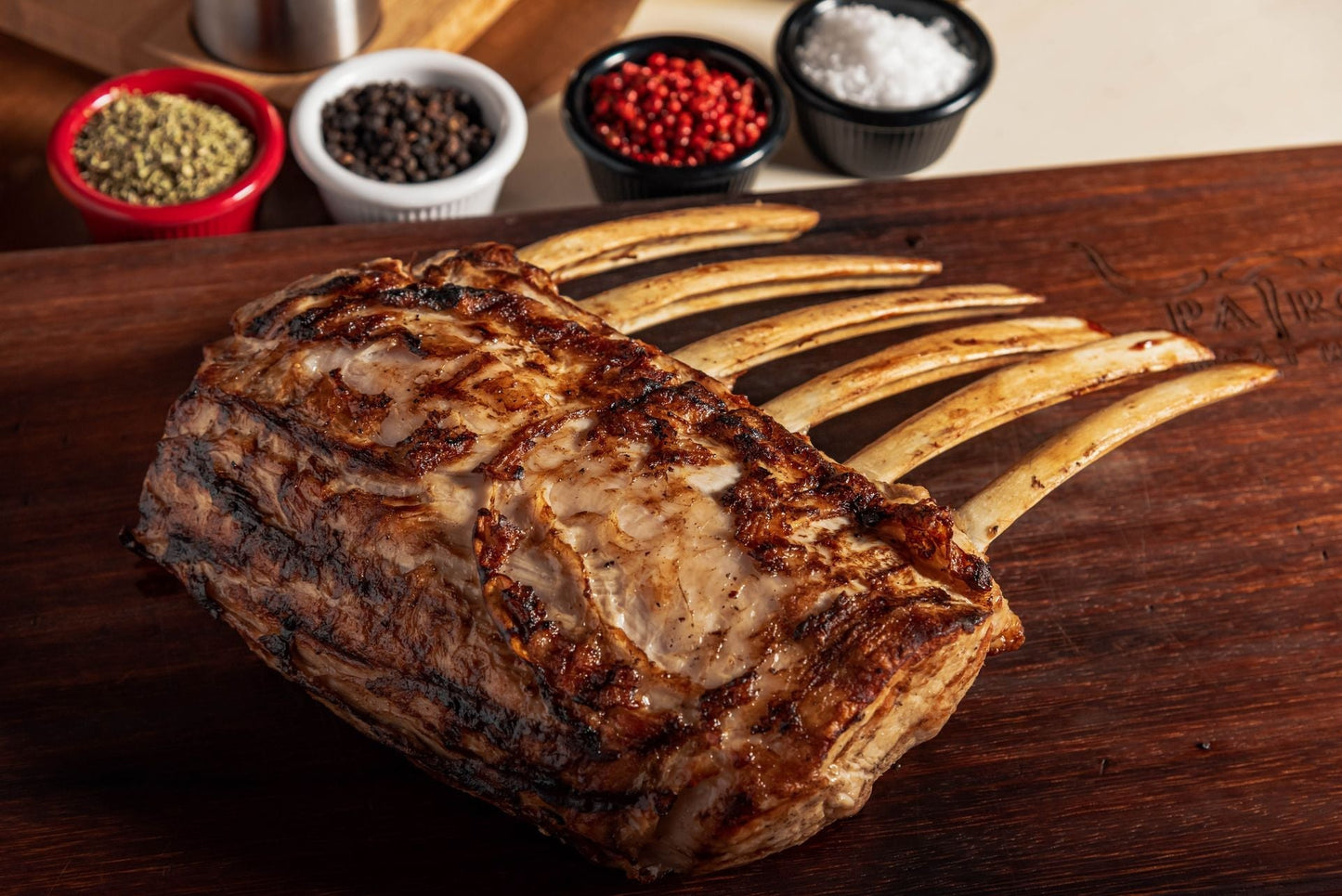 Herb-crusted rack of lamb roasted and sliced into chops