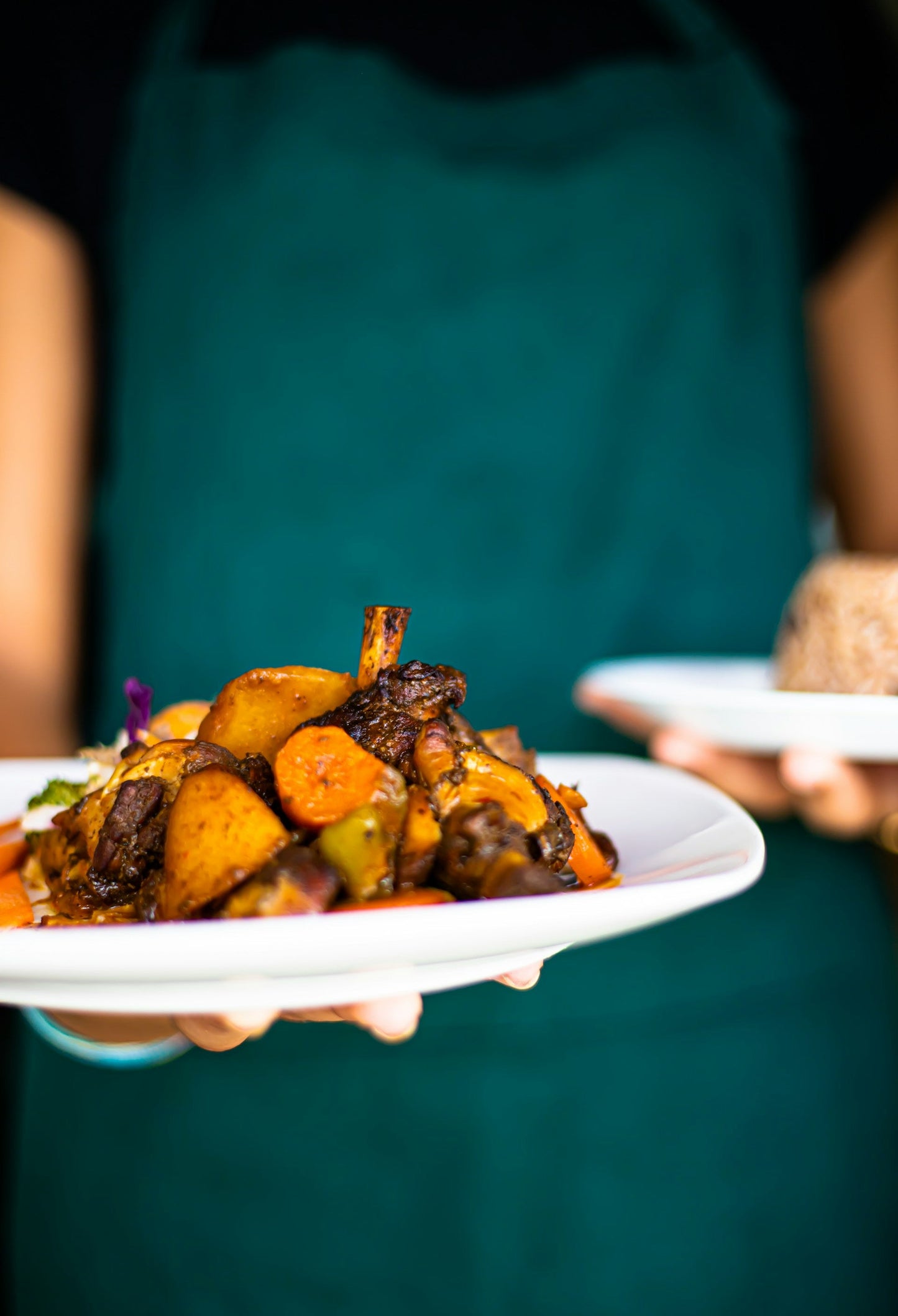 Jamaican-style goat curry with potatoes over rice