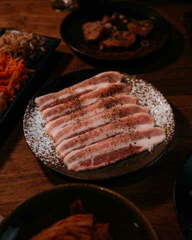 Thin-sliced lamb loin strips, bacon-style cut