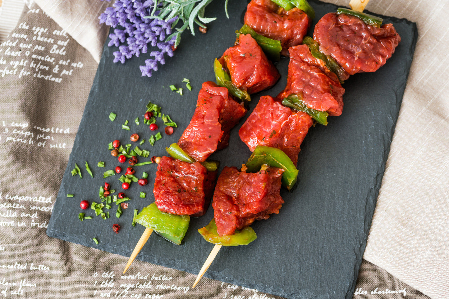 Seasoned sirloin beef cubes ready for kabob skewers